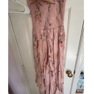 Pink Floral Romper with Asymmetrical Flowy Skirt